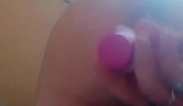 Strapon fucks herself in the ass