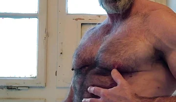Hairy Muscle Daddy Strokes Uncut Cock