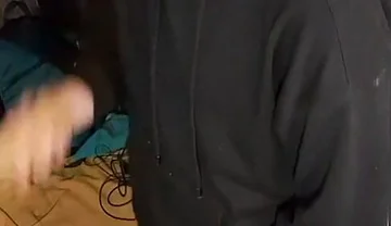 I Masturbate in Sweatpants, a Black Sweatshirt and Nike Sneakers