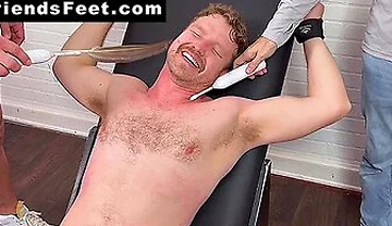 Russ Laughs Hard While His Doms Dan And Girth Tickle His Big Feet