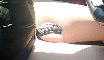 Small Penis in Cage While Driving in Pantyhose