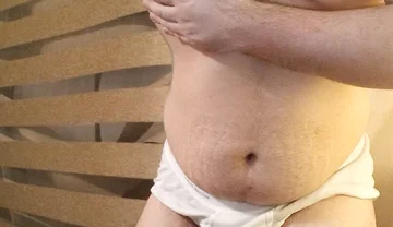 Muscular Stud Plays with His Bulge and Nipples