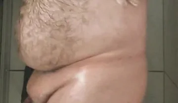 Fat Bear Taking a Shower