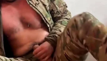 Buff Military Stud Tyler Blake Strokes His Massive Cock in Camo Uniform