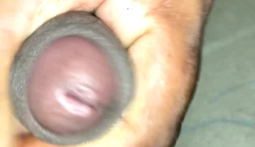 Masturbating