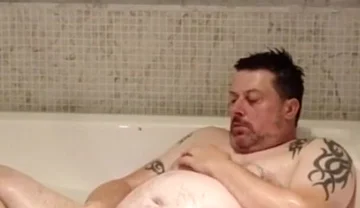 In the Big Bath Having a Wank