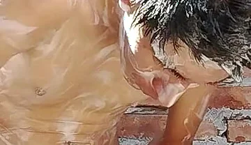 Latin Guy Bathing After a Long Day at Work