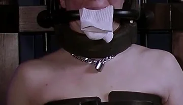 Rikki in Bondage Chair Steel Gag System & Sock Stuffing