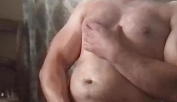 Muscle Cub Shoots a Load