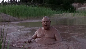 Mud Bath in Deep Quarry Mud Pond