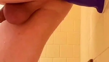 Dildo That Is Purple. Bathroom Anal Massage