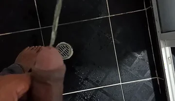 Urinating in Dark Jeans