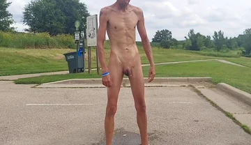 Naked and Pissing in Parking Lot