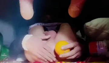 A Young Man Stuffs a Crystal Ball and an Orange up His Tight Ass.