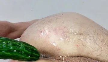 Close Up Cucumber Insertion With Massage Oil And Precum As Lube