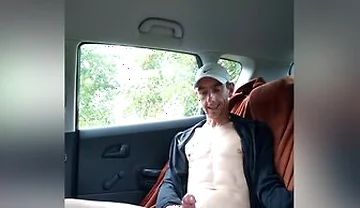 Boy Is Having A Great Time In The Back Seat Of The Car