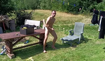 Jerking off While Hanging Out the Laundry