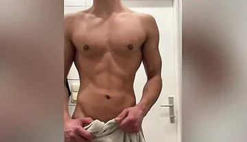 Young Muscle Hunk Show Off In The Bathroom