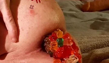 Big Load Of Gummy Bears Anal Stuffing And Expulsion Whit Prolapse