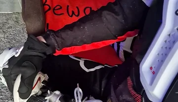 An Excited Guy in Motorcycle Gear Fucks His Sneakers