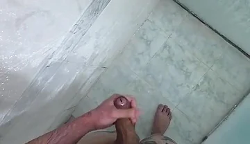 Jerking off to the Shower