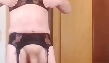 Andreas with suspender belt and bra jerking off