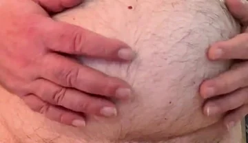 Coach Karl Rubs His Belly 6811