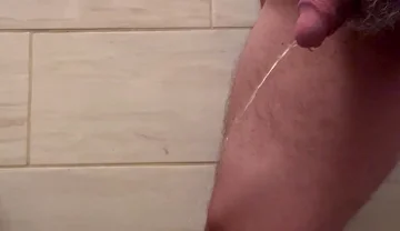 Man Pee in Bathroom