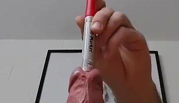 Sounding an Eding Pen While Stretching My Testicles