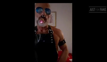 Stepdad lighting his Cigar in rubber apron
