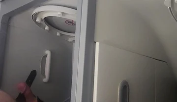 Airplane Bathroom Jerk and Cum.