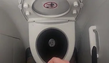 Airplane Bathroom Jerk and Cum.