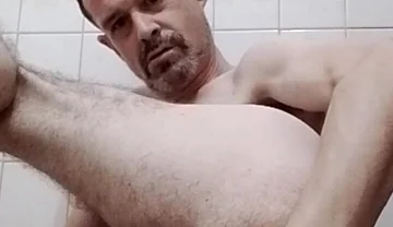 Younger Stepdaddy with Hairy Ass and Balls Fists Himself