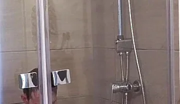 After a Full Day on the Road Wet Solo in the Hotel Shower