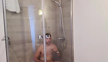 After a Full Day on the Road Wet Solo in the Hotel Shower