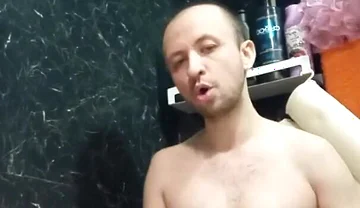 A Naked Man Jerks off His Big Dick in the Bathroom.