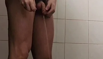 Pissing in the Locker Room Floor While Bathing