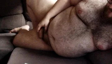 Fat Hairy Jerks off While Watching Porn