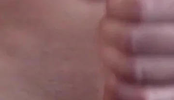 Masturbating
