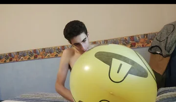 Blowing up a Huge Smiley Balloon While Jerking off