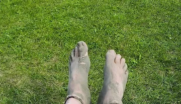Barefoot Waiting for the Tide on the Beach