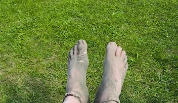 Barefoot Waiting for the Tide on the Beach