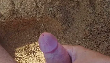 Ladysilva Masturbating His Cock on a Deserted Beach Until He Cums Hot