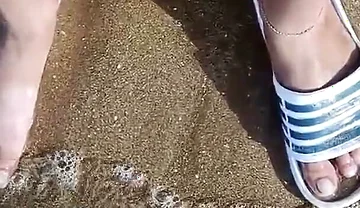 Feet and the Sea Extra Slowmotion - One Foot Barefoot and Foot in Slide - Great Feet in Sea