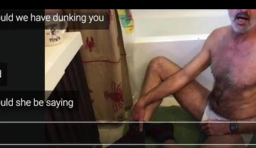 Guy Getting Dunked in a Tub.