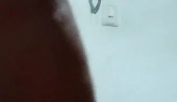 Spilling milk while my neighbor stares out the window