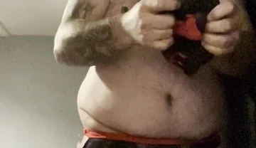 Anal Crossdressers Cuffed Cock and Ball with Pierced Nipples