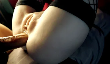 A Beauty in Stockings Spreads Her Charms in Front of a Big Cock