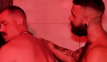 Three Muscular Man in a Train Formation