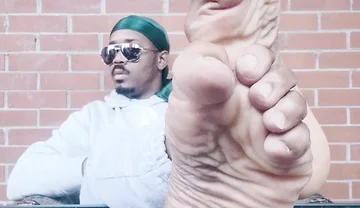 I Expose My Feet and I Touch Them